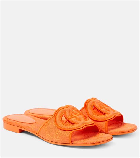 orange gucci slides|gucci gg cutout slides.